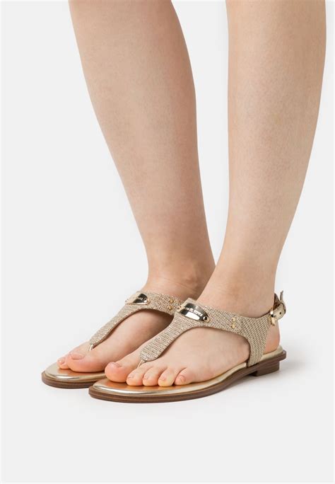 michael kors plate thong sandal gold|Michael Kors mackenzie platform sandals.